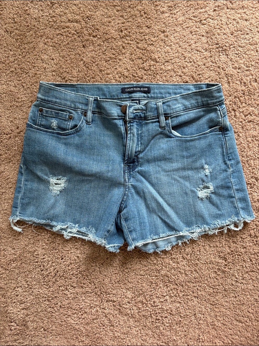 Calvin Klein Jeans light blue distressed cut-off denim shorts
